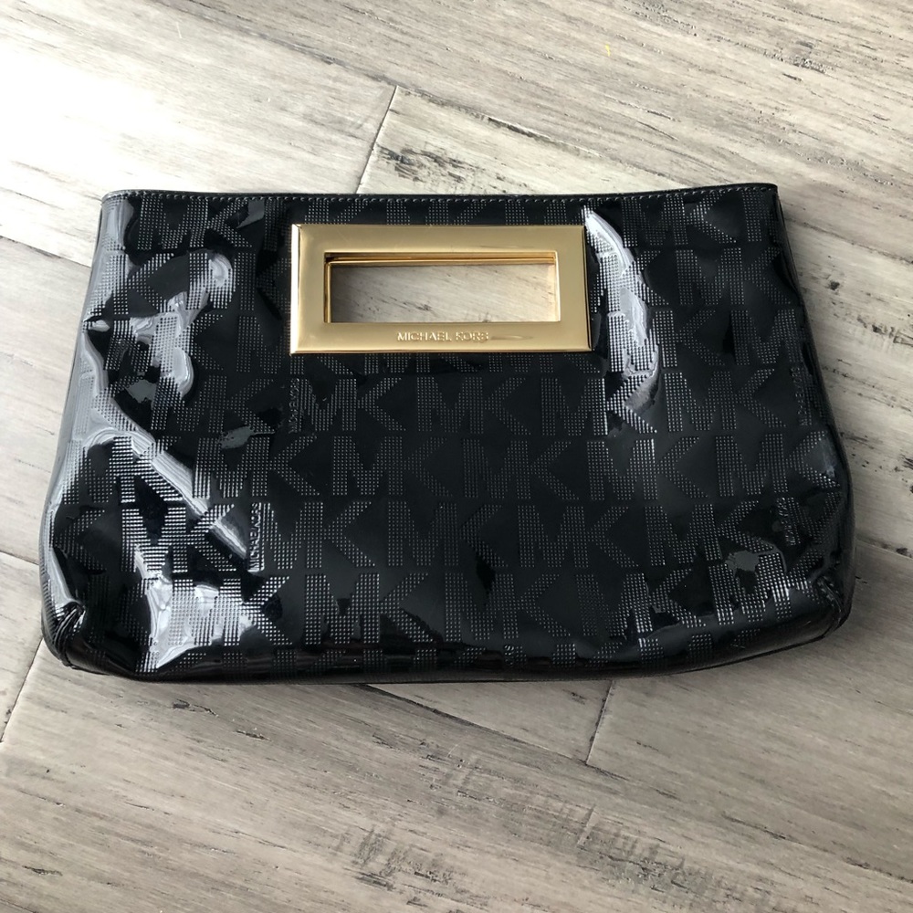 MK clutch black with gold accents